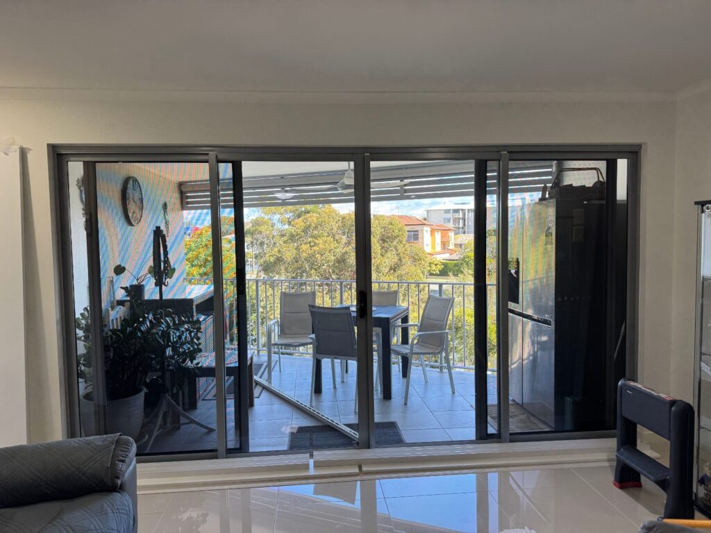Living room in Redcliffe with plantation shutters open to let in natural light