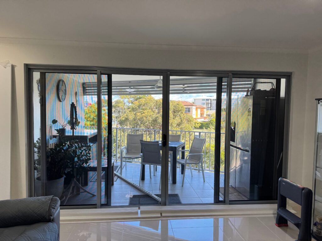 Plantation shutters closed for privacy in a Redcliffe living room