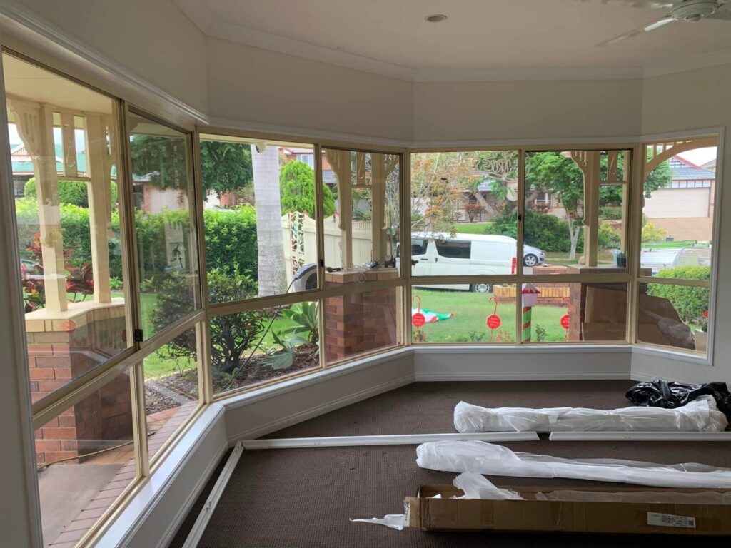 Murrumba Downs living room bay window before the plantation shutters went in, looking out to the front garden and street